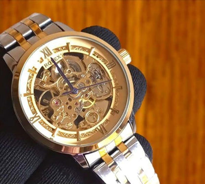 Men’s Silver Automatic Stainless Steel Watch – Rose Gold Face, Water Resistant, Glass Back .